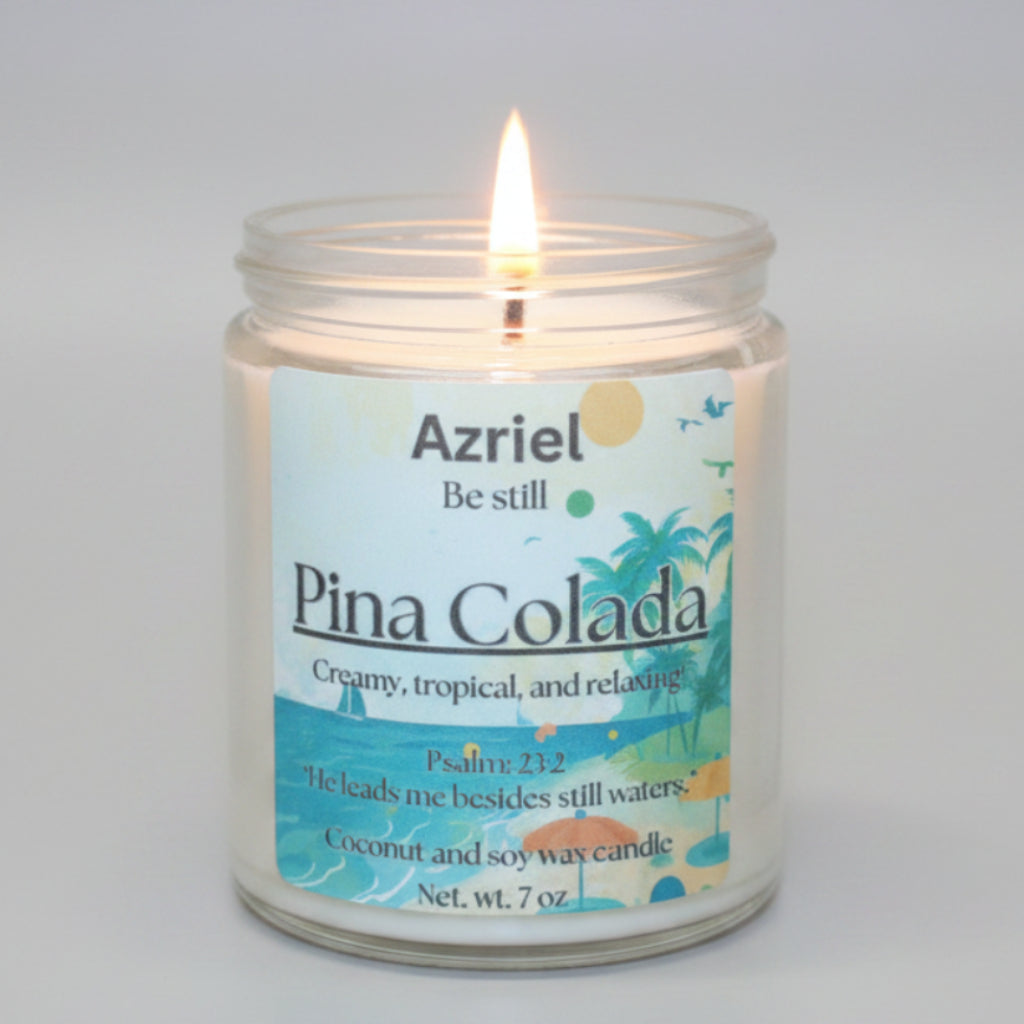 Candle labeled 'Pina Colada' by Azriel with coconuts and pineapple on a beach background
