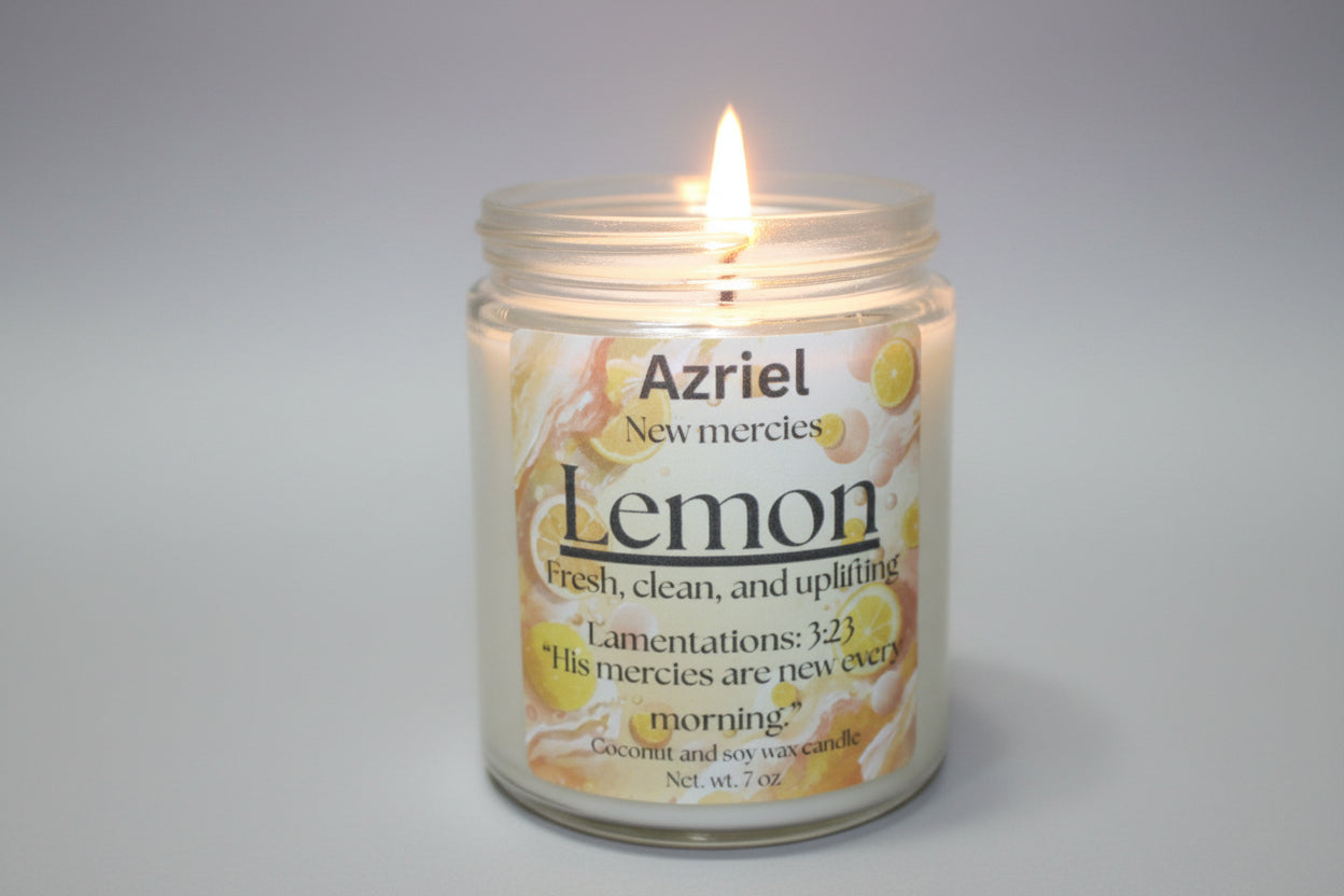 Candle in a jar labeled 'Azriel Lemon' with a flame against a neutral background