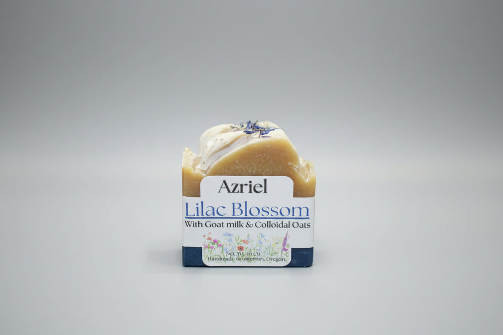 Bar of soap with 'Azriel Lilac Blossom' label on a cardboard background