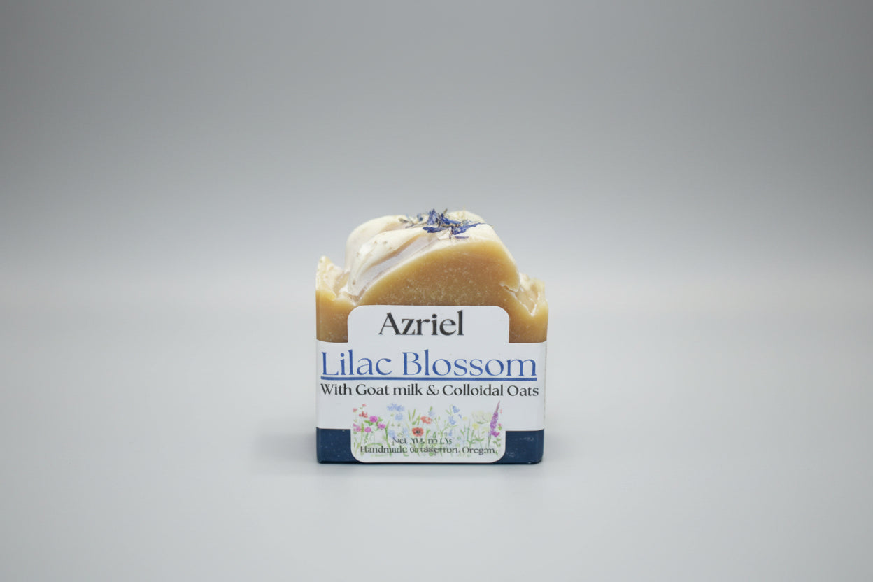 Bar of soap with 'Azriel Lilac Blossom' label on a cardboard background