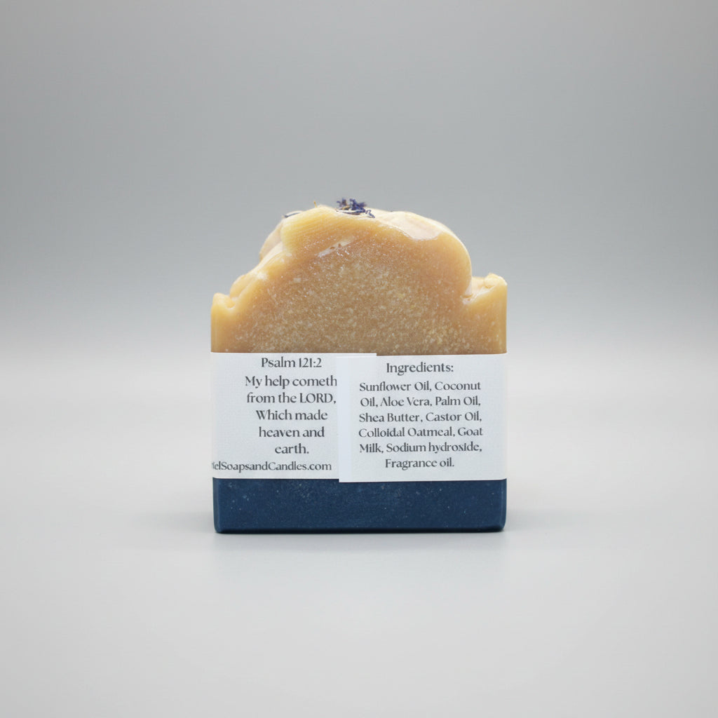Bar of soap with a label detailing ingredients and a biblical verse on a brown background