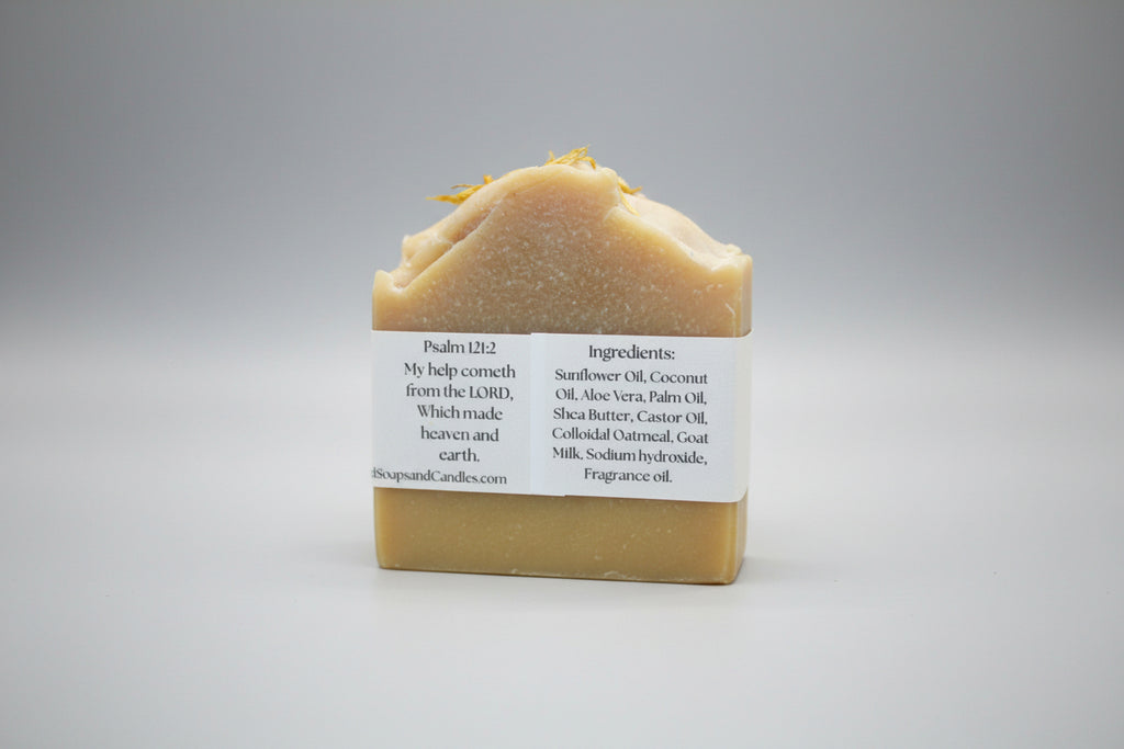 Bar of soap with a label on a brown background