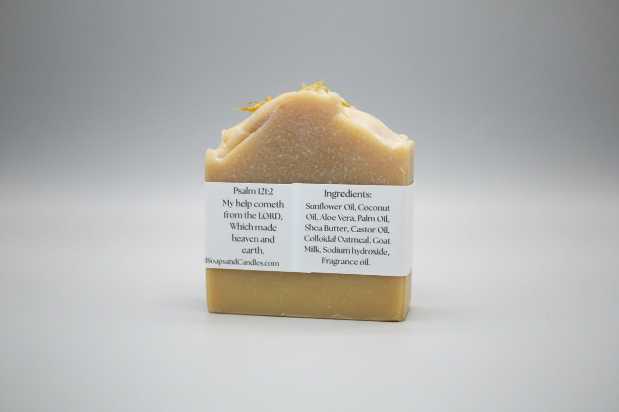 Bar of soap with a label on a brown background
