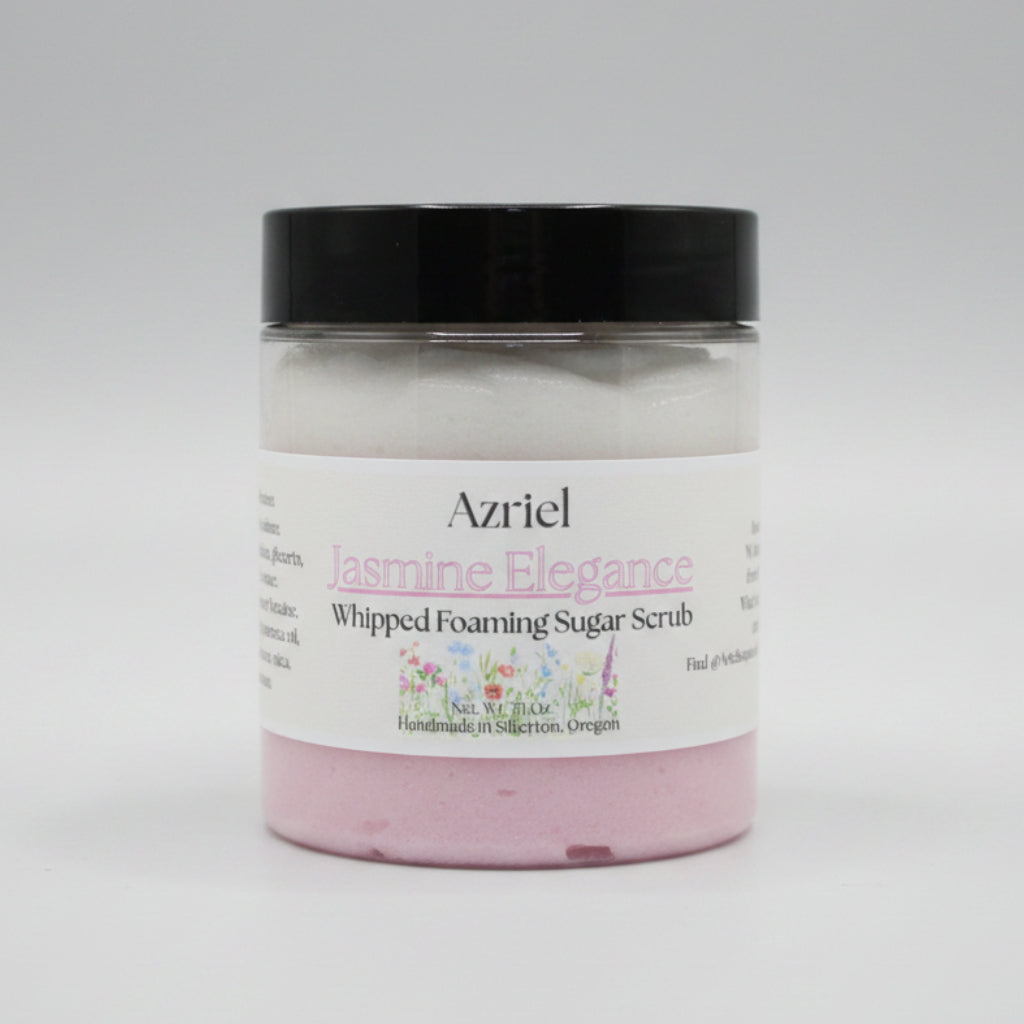 Jar of Azriel Jasmine Elegance Whipped Foaming Sugar Scrub on a beige background