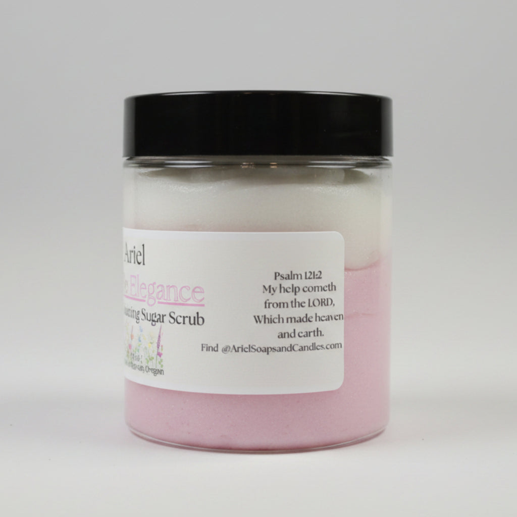 Jar of pink sugar scrub with a black lid on a beige background