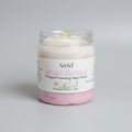 Jar of Azriel Jasmine Elegance Whipped Foaming Sugar Scrub on a cardboard background
