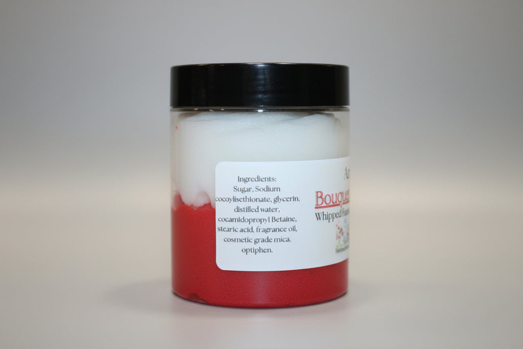 Jar of whipped cream with a visible label on a cardboard background