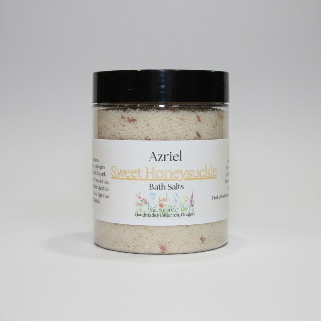 Jar of Azriel Sweet Honeysuckle bath salts on a beige background
