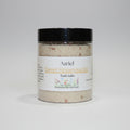 Jar of Azriel Sweet Honeysuckle bath salts on a beige background