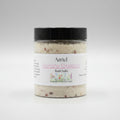 Jar of Azriel Jasmine Elegance bath salts on a wooden surface