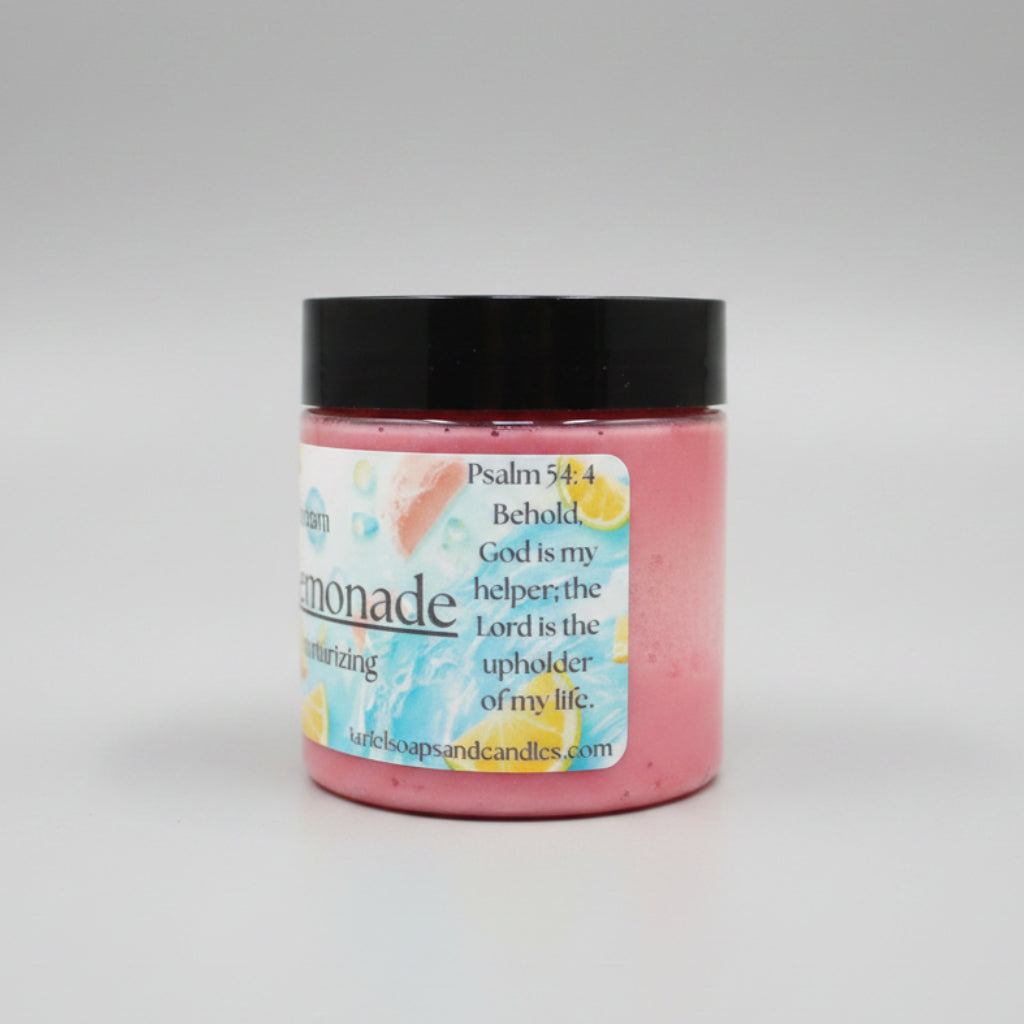 Pink candle jar with black lid on a beige surface