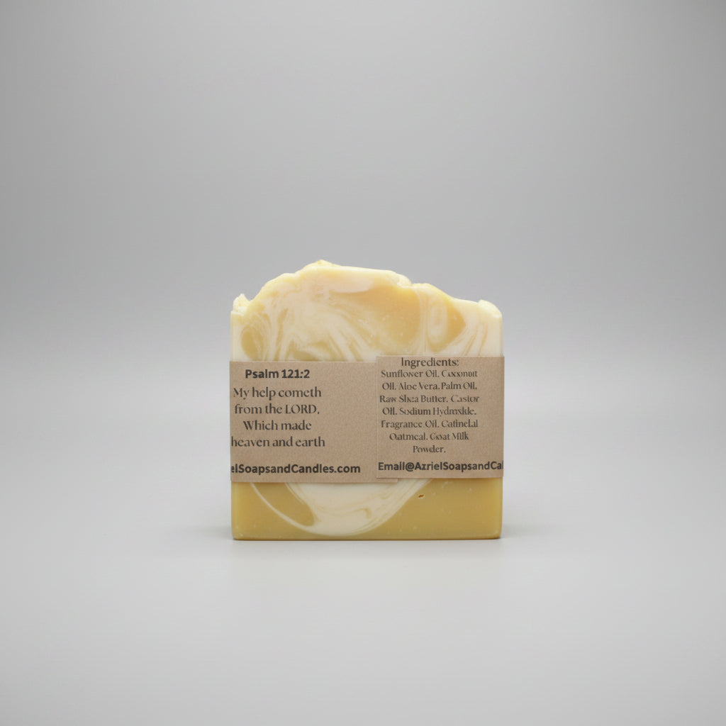 Bar of soap with a label on a brown surface
