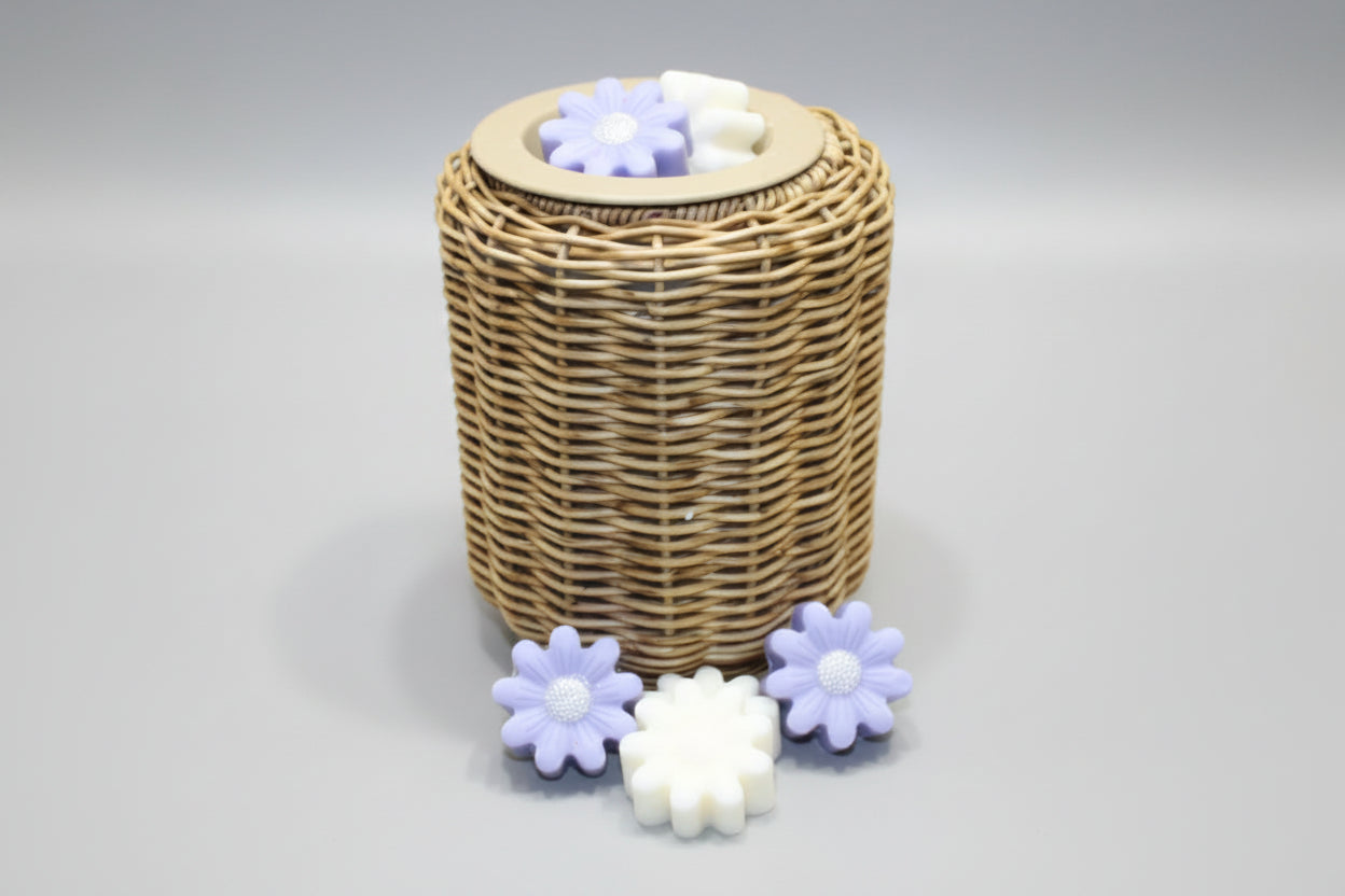Wicker basket with floral-shaped items on a tiled bathroom floor
