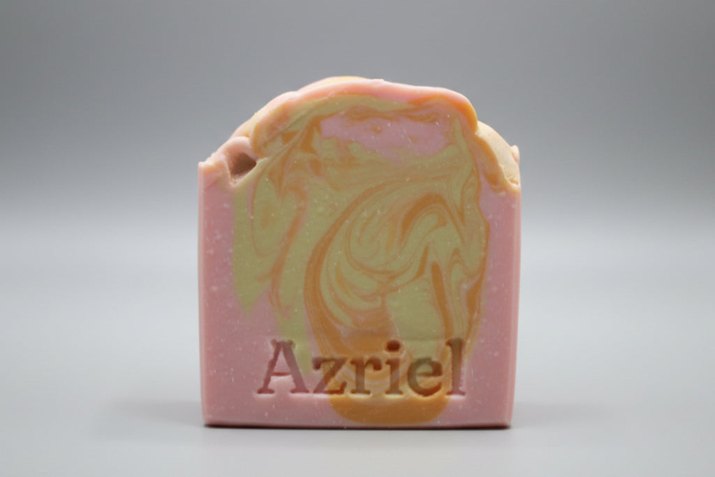 Marbled soap bar with 'Amie' branding on a neutral background