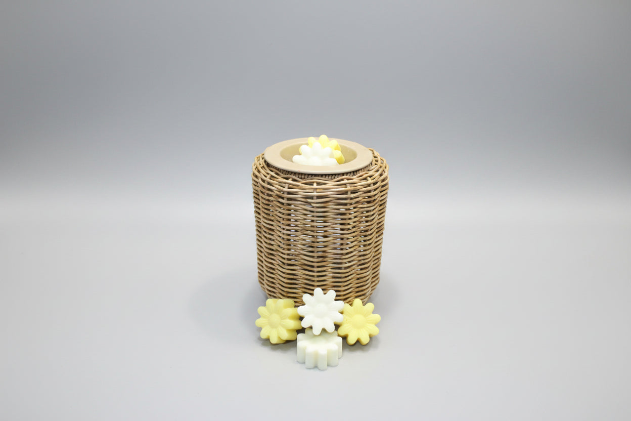 Wicker basket with decorative items on a brown surface