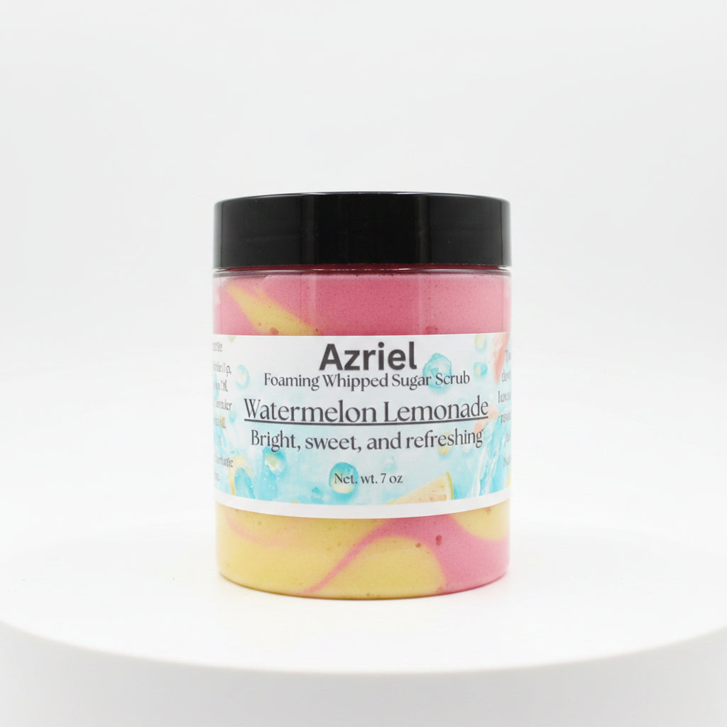 Jar of Azriel Foaming Whipped Sugar Scrub in Watermelon Lemonade flavor on a cardboard background