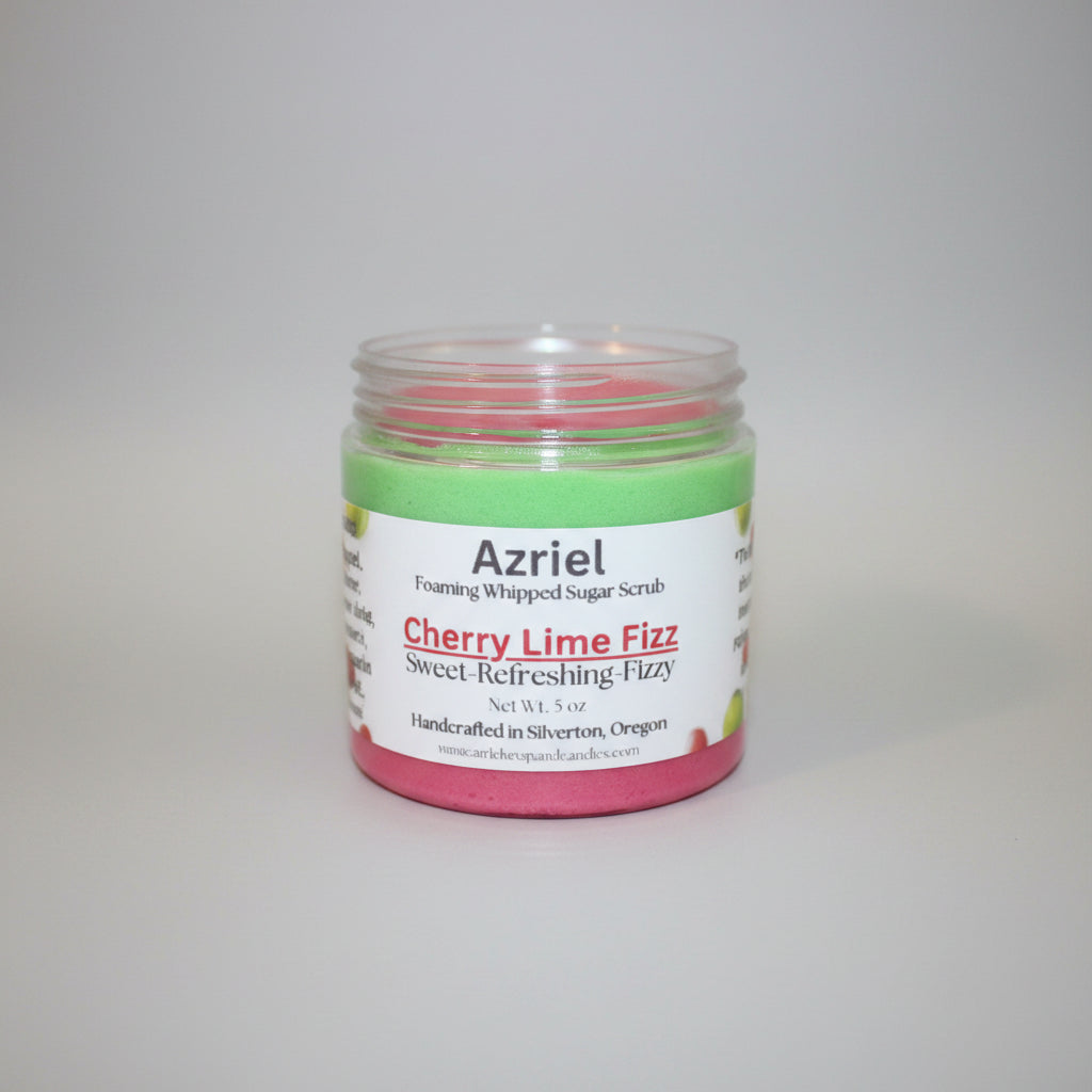Jar of Azriel Cherry Lime Fizz foaming whipped sugar scrub on a brown background