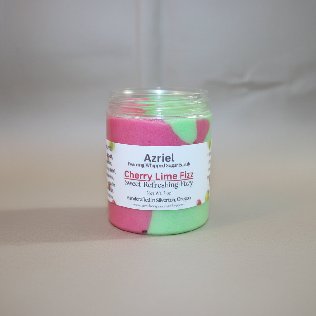 Jar of cherry lime fizz sugar scrub with a visible brand label on a brown background